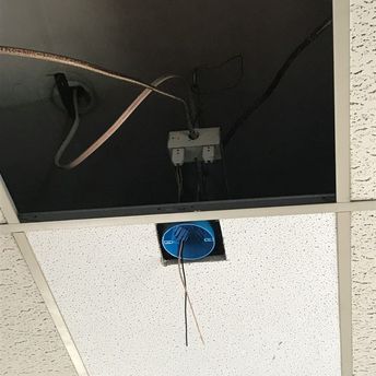 The new ceiling tile and junction box